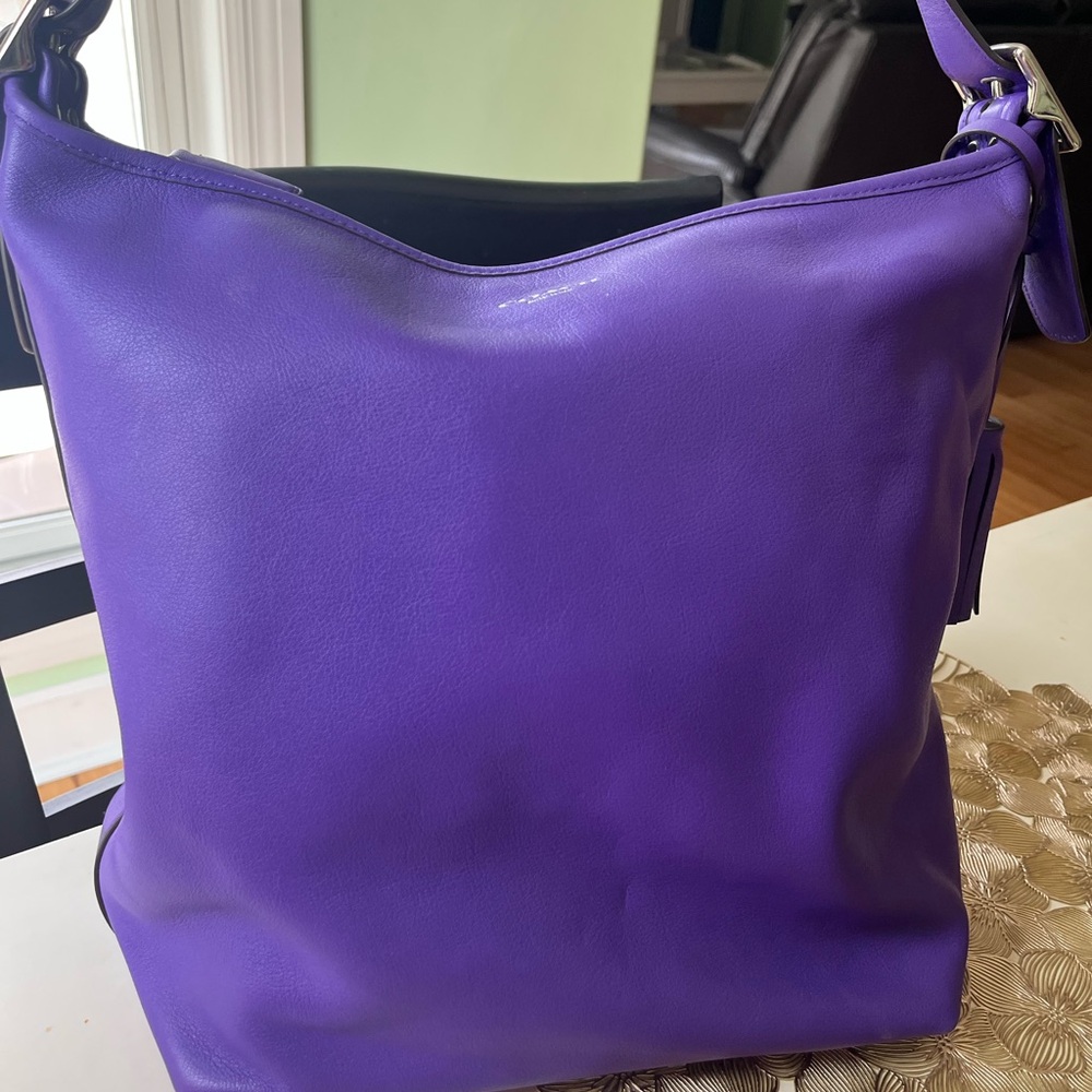 Coach purple leather bucket style crossbody bag